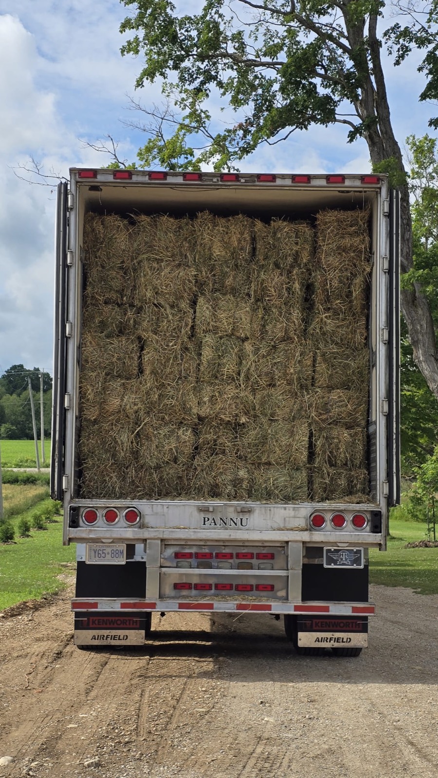 Trailer loaded with baled hay